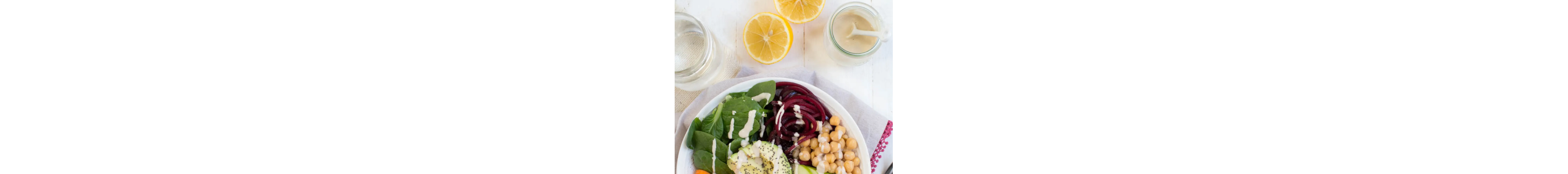 Salad next to lemons