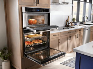 An array of dishes in a Maytag® combination wall oven