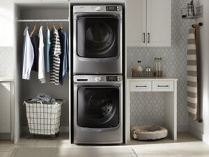 Gray, stacked front load Maytag® laundry pair in a laundry room