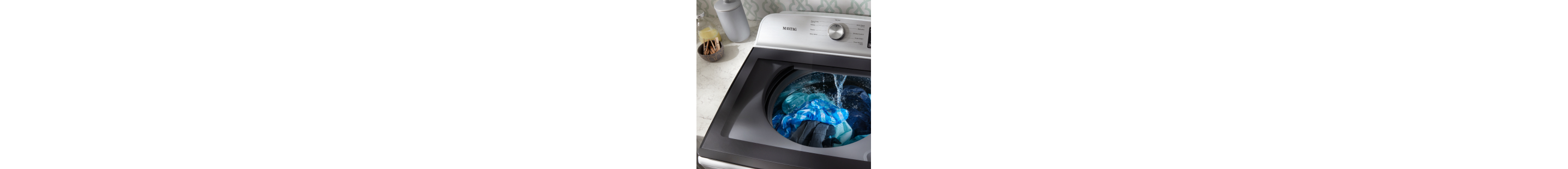 Maytag® washing machine with water pouring in