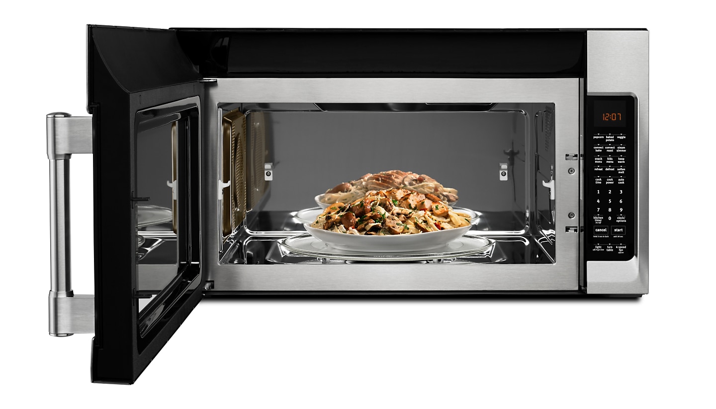 A bowl of food sits inside a Maytag® convection microwave.