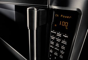 A close-up of the control panel of a Maytag® convection microwave.