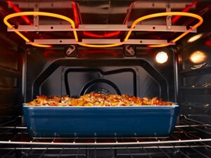 Casserole cooking inside an electric oven