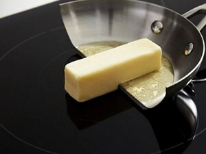 Butter in a frying pan on an induction cooktop