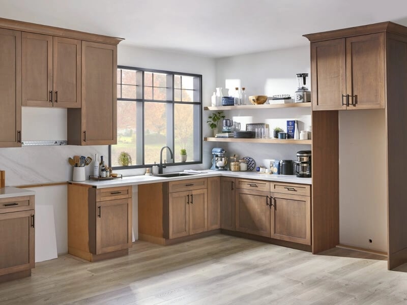 Kitchen showing cabinet openings for appliances