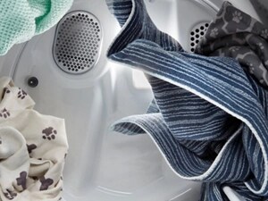 Towels and blankets rotating inside a dryer drum