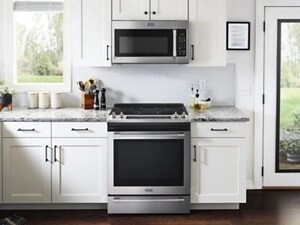 Over-the-range microwave sitting above a slide-in range