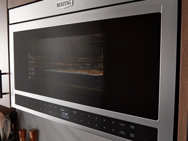 Flush microwave with food cooking inside