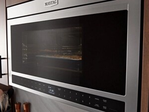 Flush microwave with food cooking inside