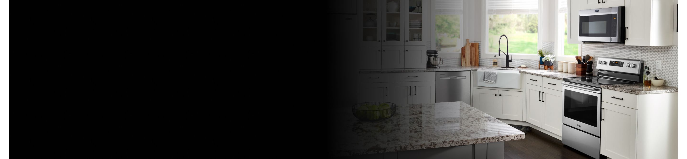Maytag® appliances in a kitchen with white cabinets