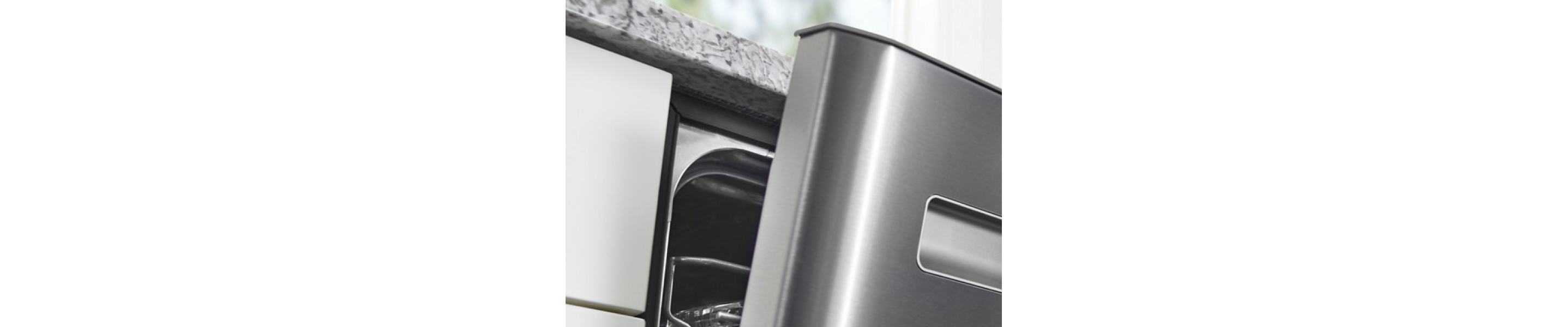 A closeup of an open dishwasher