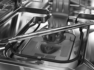 The bottom of an empty dishwasher