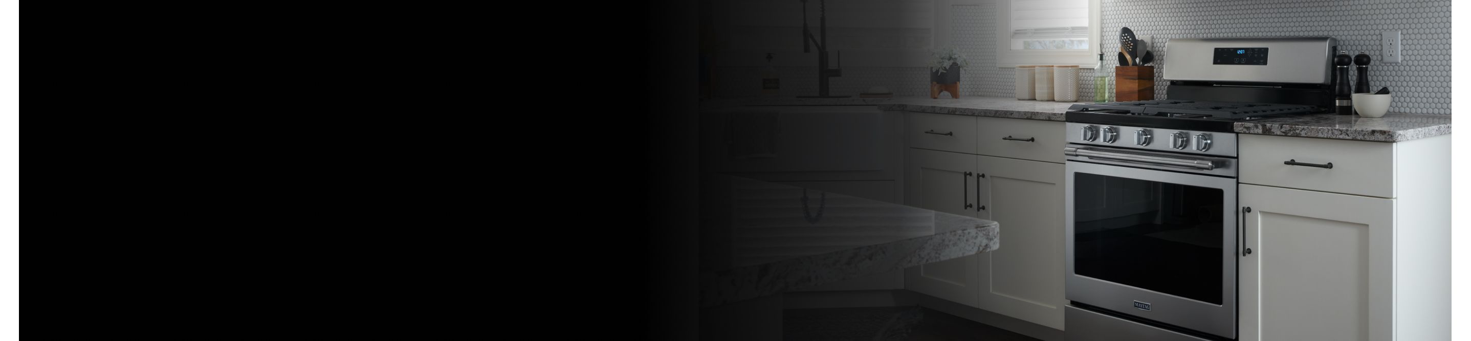 Maytag® range in white cabinetry