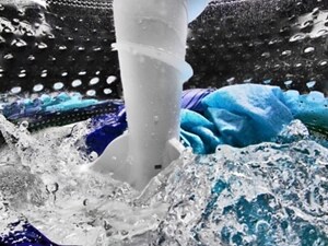 Closeup image of clothing in a wash cycle in a washing machine