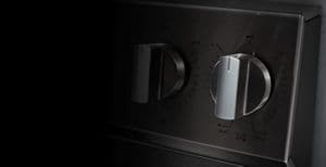 Close-up of knobs on a Maytag® range