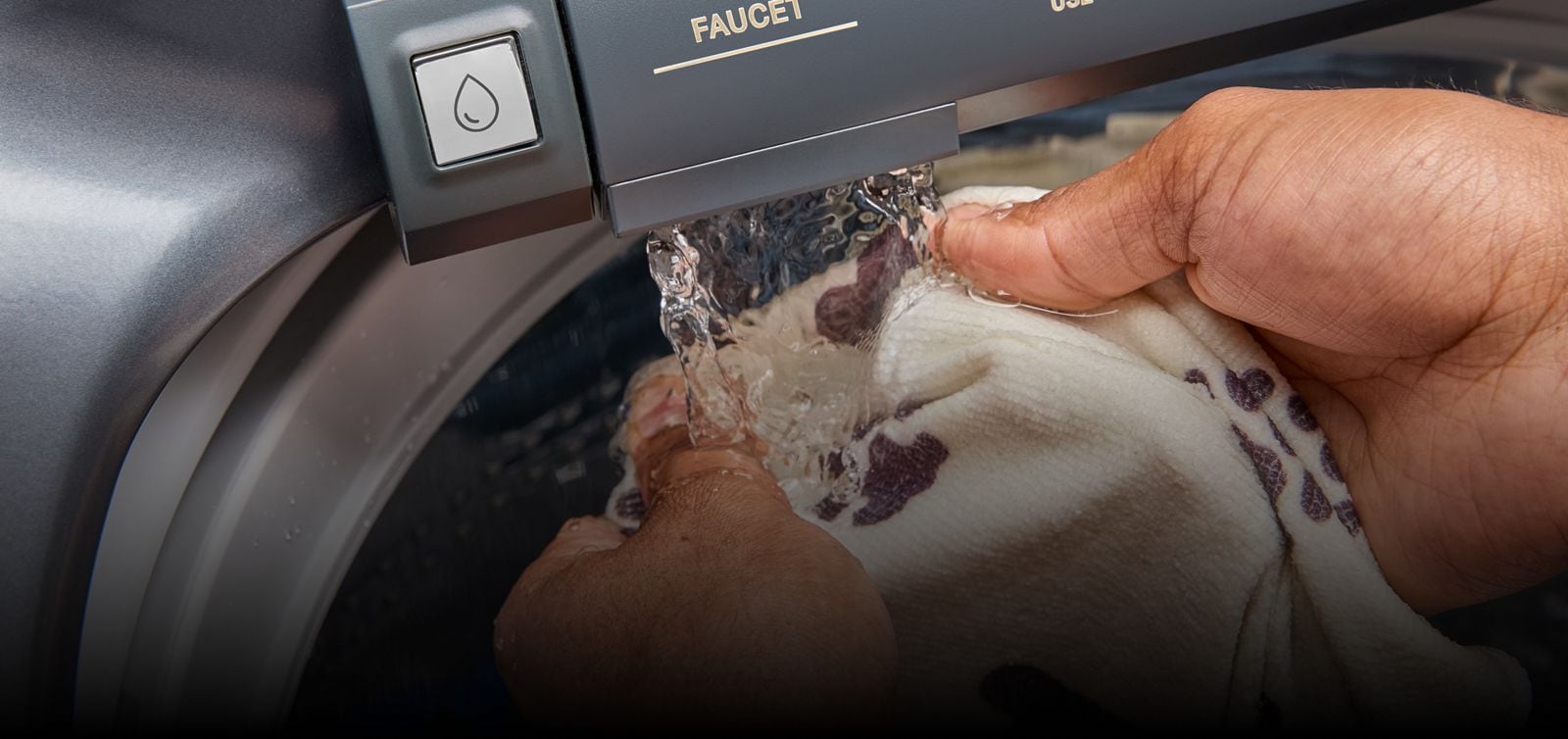 A closeup of the built-in water faucet.