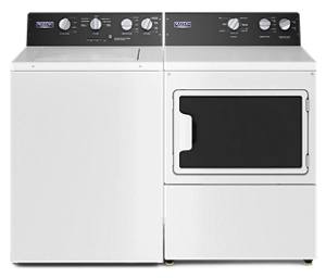A Maytag® commercial laundry set in white.