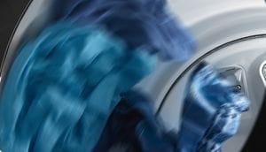 Clothes tumbling in a dryer.