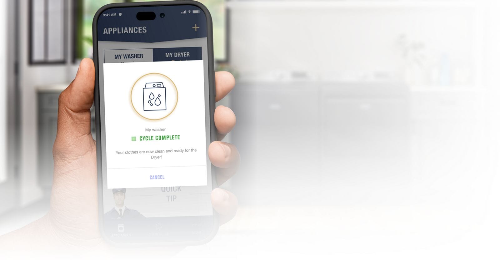 A hand holding a phone with the Maytag™ app screen