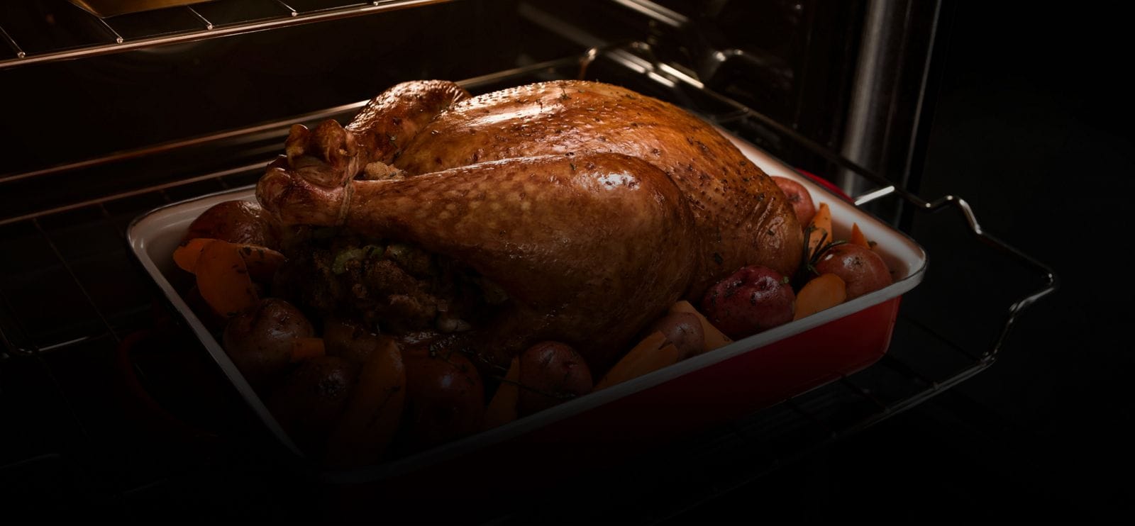 A turkey roasting in the oven.