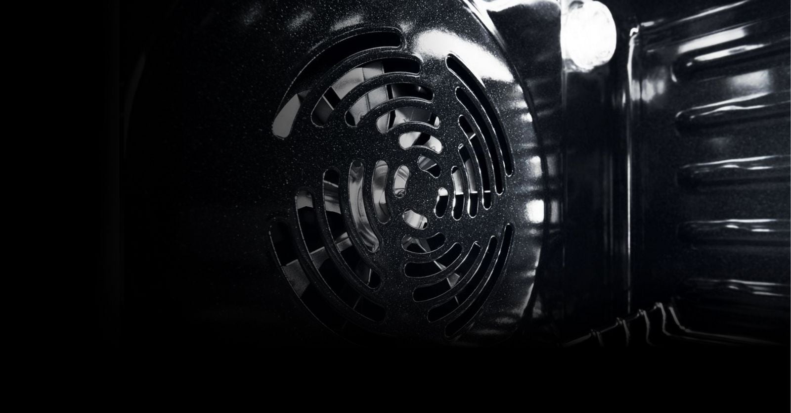 Close up of a convection oven fan.
