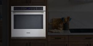A Maytag® stainless steel wall oven in a kitchen.
