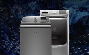 Interior view of a Maytag® washing machine cleaning blue clothes.