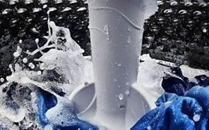 Interior view of a Maytag® washing machine with an agitator.