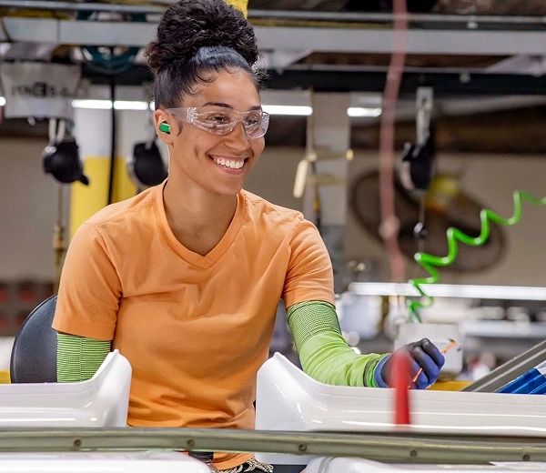 A person working in a product factory