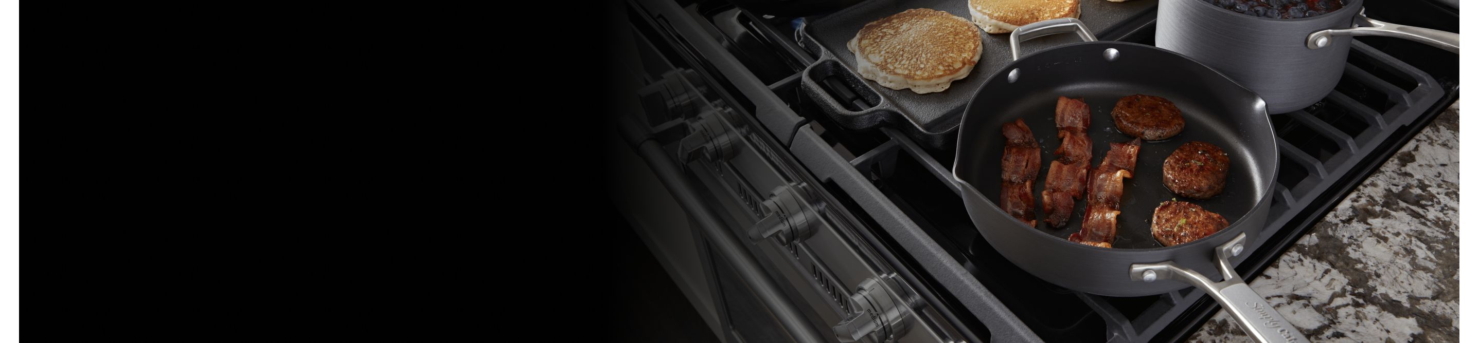 Pans cooking breakfast foods on a Maytag® cooktop