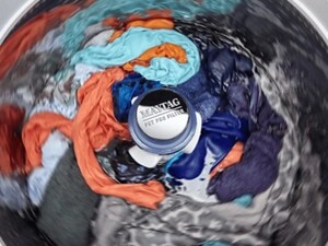 Laundry getting washed in a Maytag® washer with an impeller